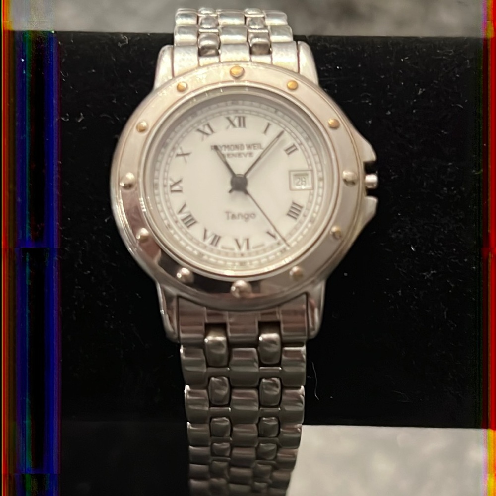 Raymond Weil Tango watch. Broken crown (knob where you wind it).